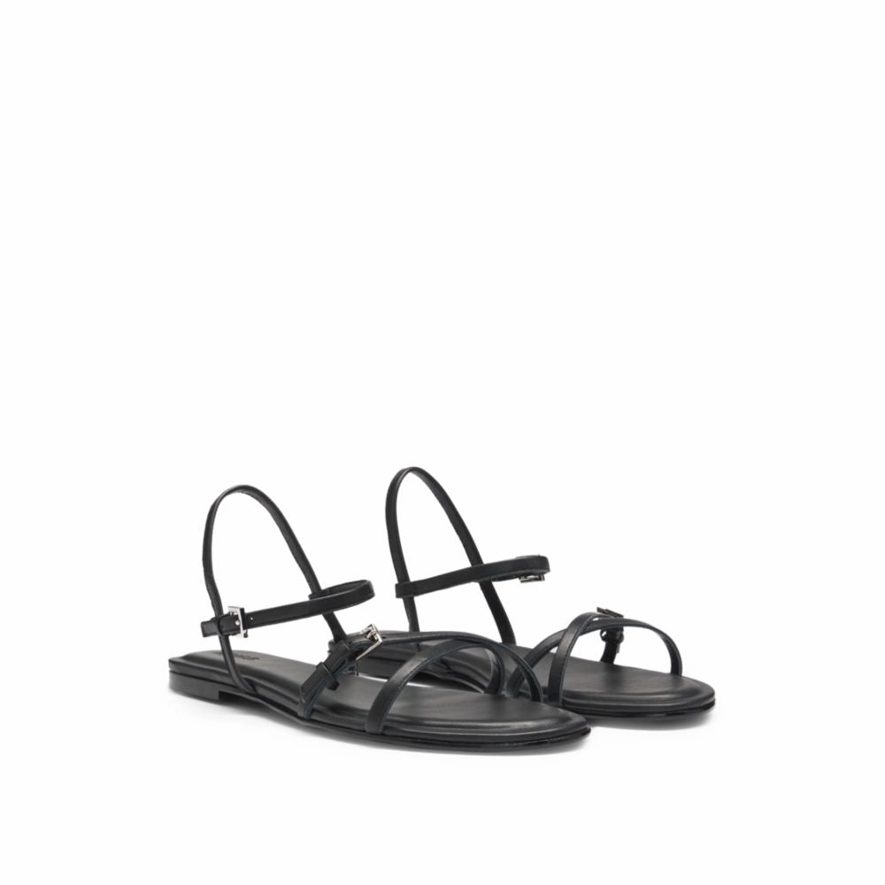 Flat sandals in nappa leather with logo buckles